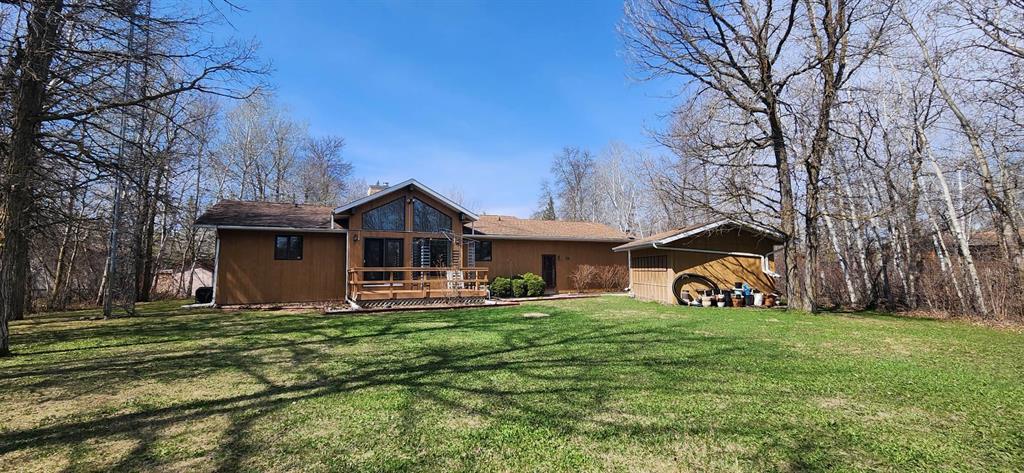 Rear view of 17 Nicklaus Close and the backyard