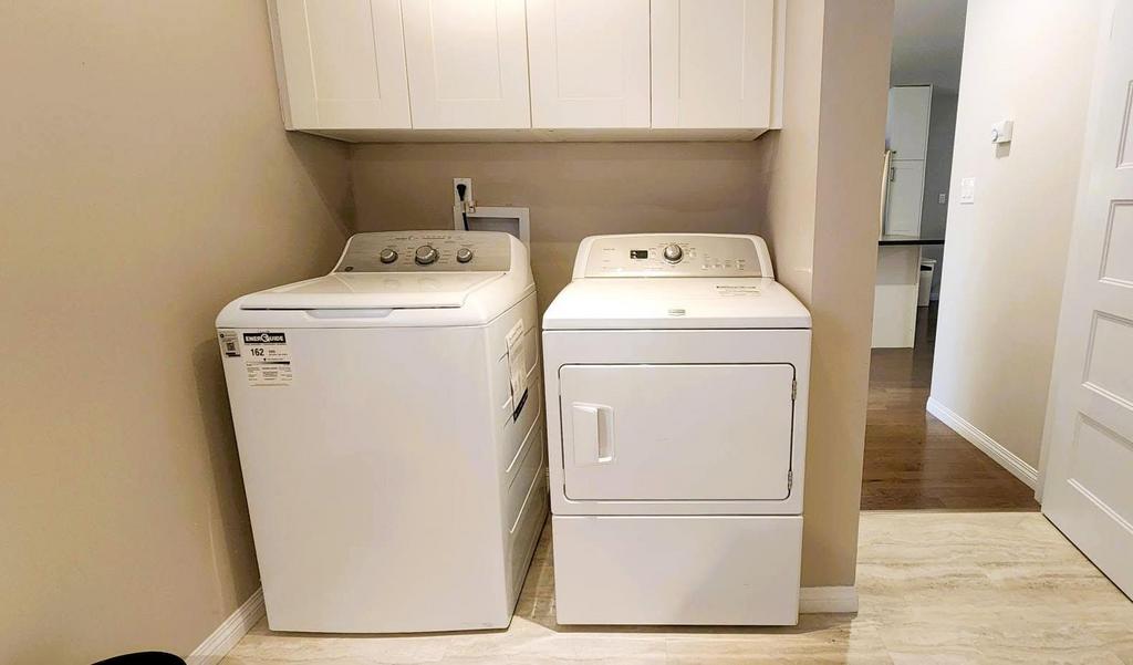 189 6th Street, Gimli &middot; main-floor laundry with washer and dryer