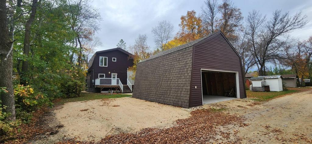 189 6th Street, Gimli &middot; the double detached garage and the back of the house