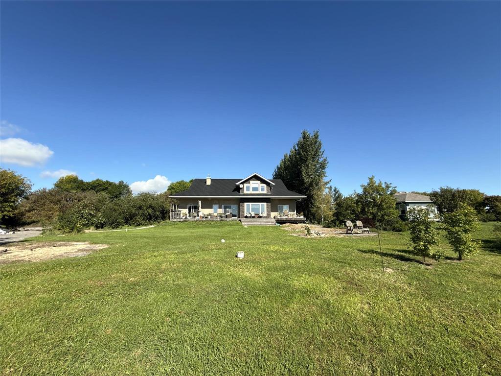 20053 Minerva Road &middot; the house seen across the lawn from the water side