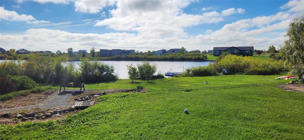20053 Minerva Road &middot; the open lawn running down to the water