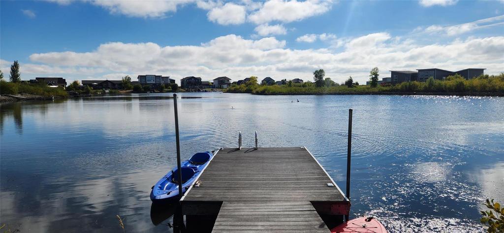 20053 Minerva Road &middot; the private dock on the water, with a kayak tied alongside