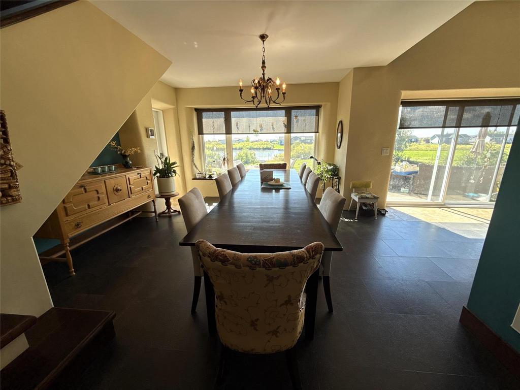20053 Minerva Road &middot; the dining room looking out to the windows