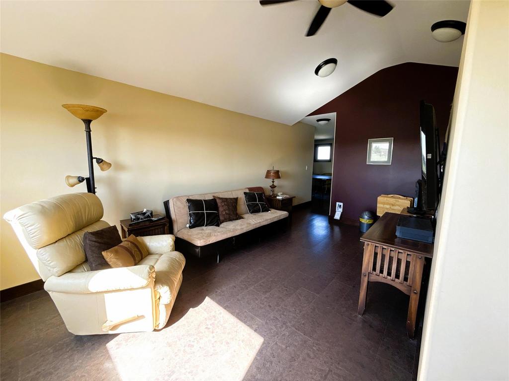20053 Minerva Road &middot; the upstairs family room, with seating under the sloped ceiling