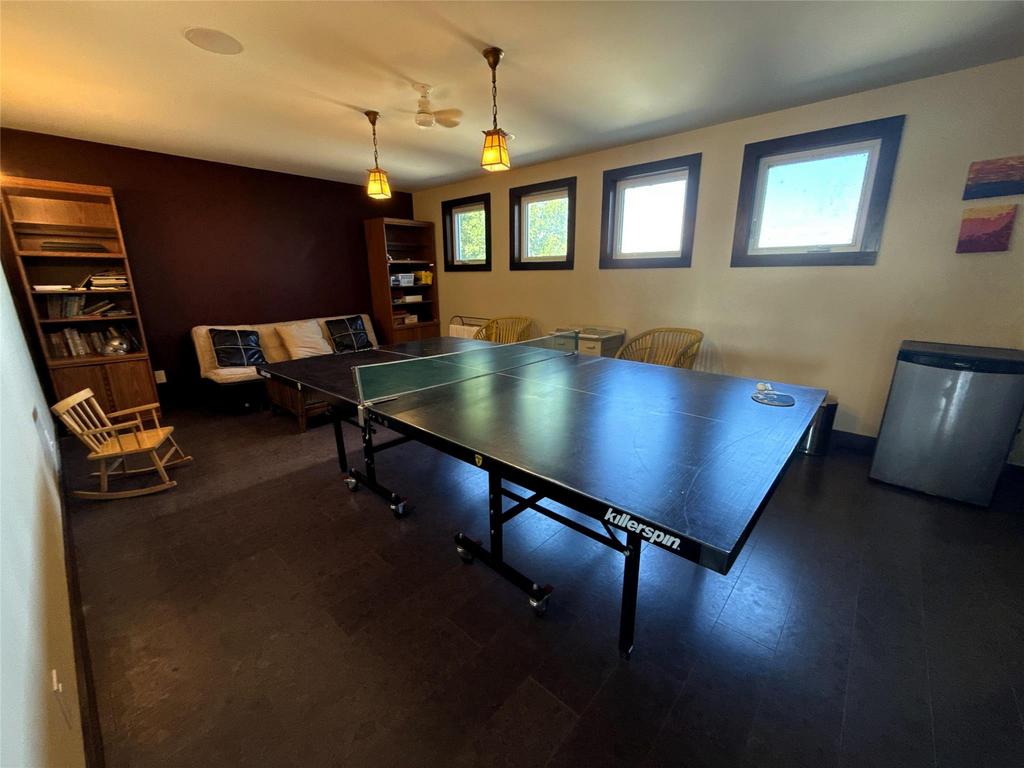 20053 Minerva Road &middot; the upstairs recreation room, set up with a table tennis table