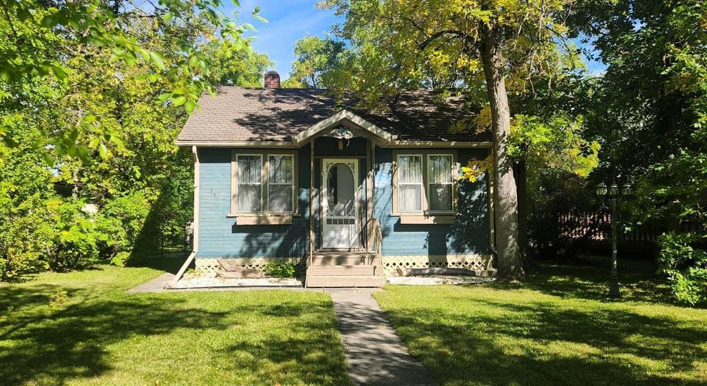 241 Maple Avenue &middot; the cottage and its front yard from the street side