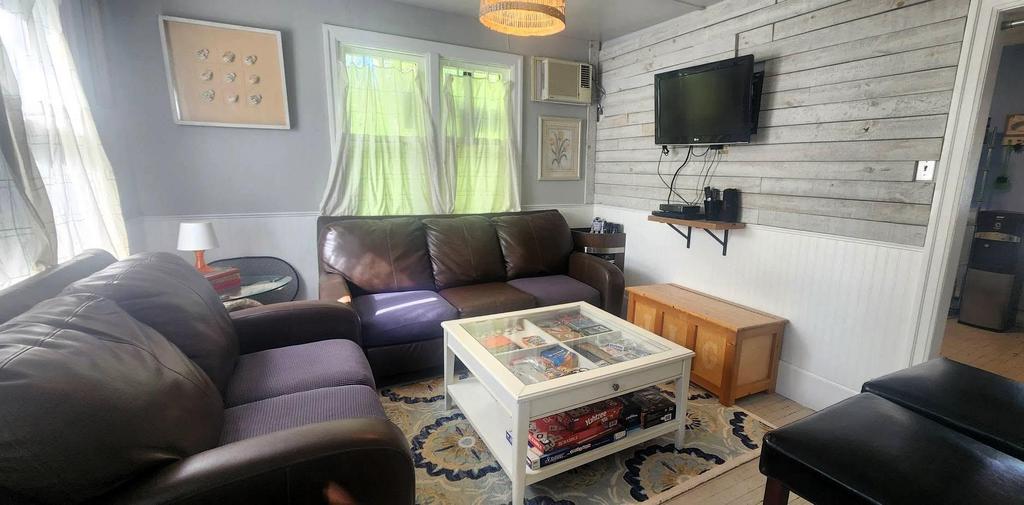 241 Maple Avenue &middot; the living room from the other side, with the wall-mounted television