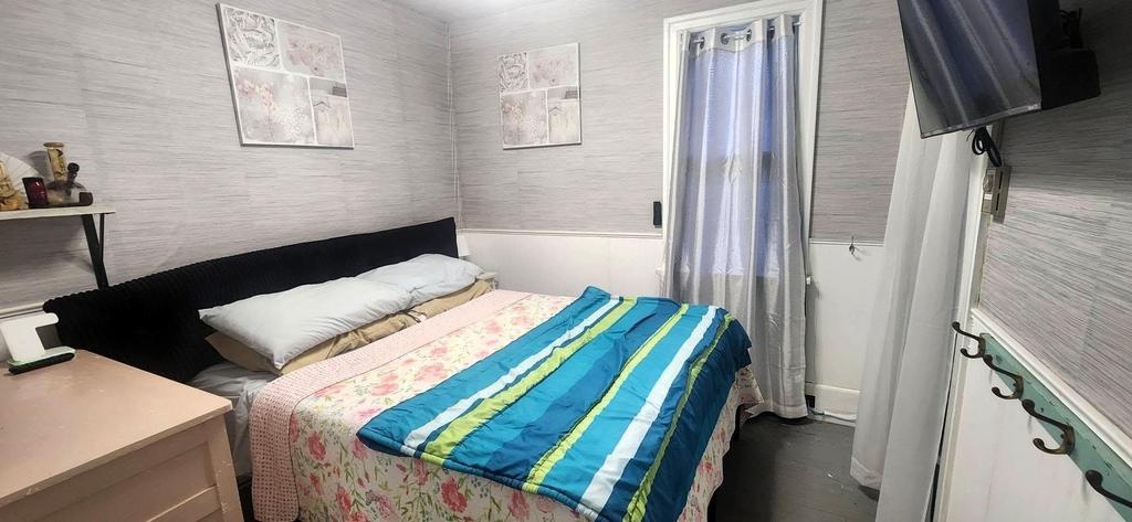 241 Maple Avenue &middot; the second bedroom, with a double bed and a window