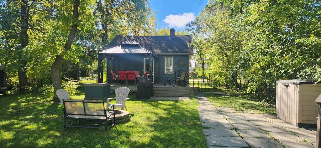 241 Maple Avenue &middot; the back of the cottage from the yard, with the covered deck
