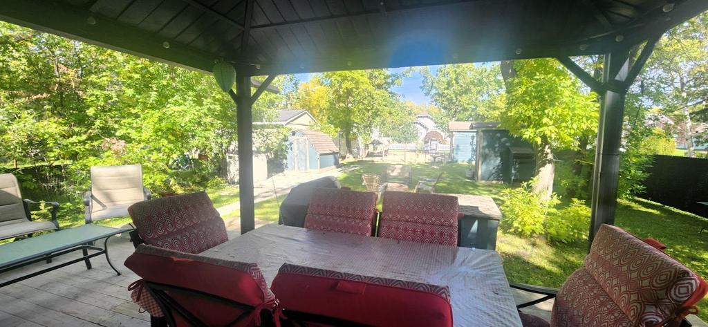 241 Maple Avenue &middot; the covered back deck looking out over the yard