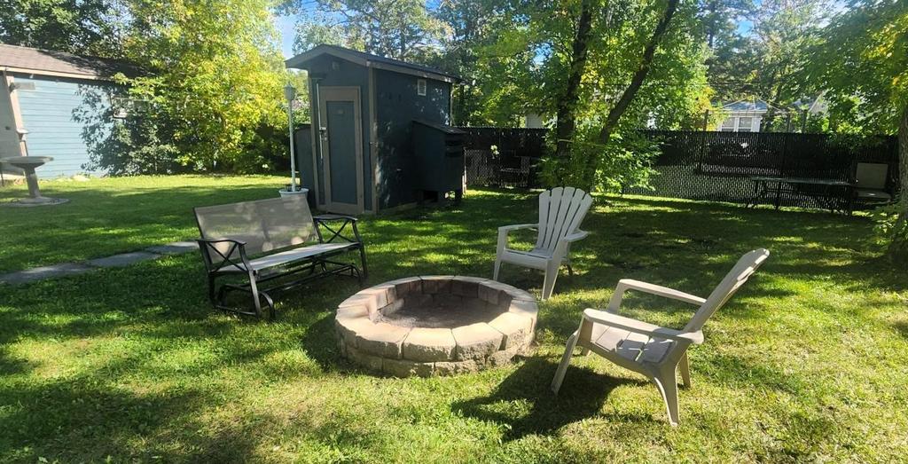 241 Maple Avenue &middot; the firepit with chairs around it in the back yard