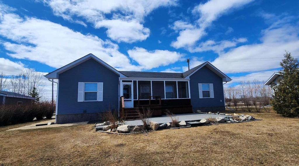 Front view of 30 Sunset Boulevard, waterfront home in Siglavik