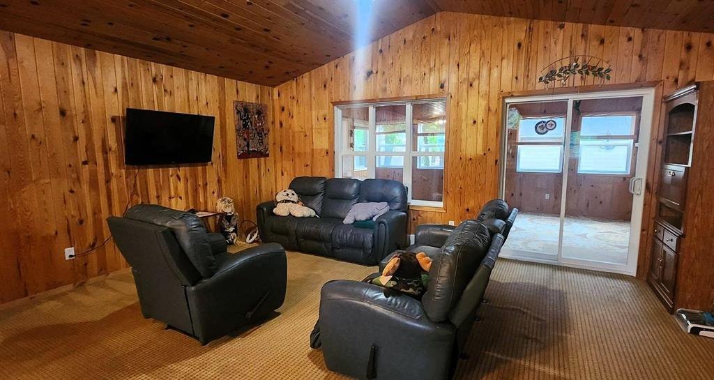325 Epsilon Avenue, Winnipeg Beach &middot; living room looking toward the patio doors
