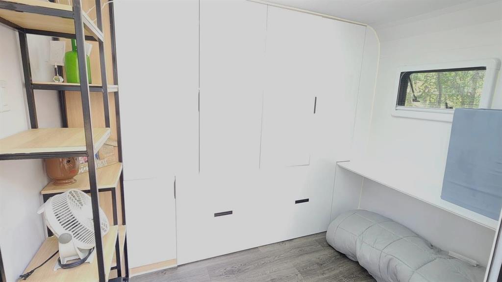 35 Thorvaldson Drive, Arnes · inside the cube bunkie, with a pull-out double bed