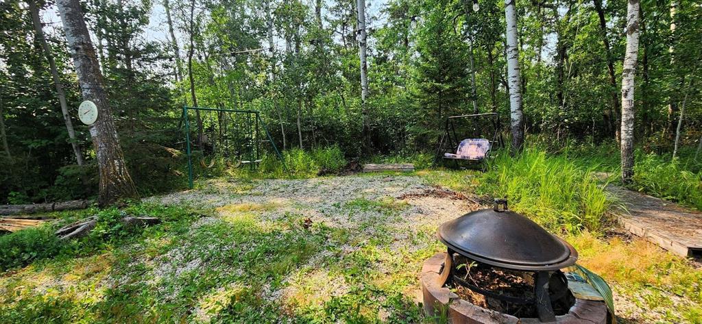 35 Thorvaldson Drive, Arnes · backyard firepit area