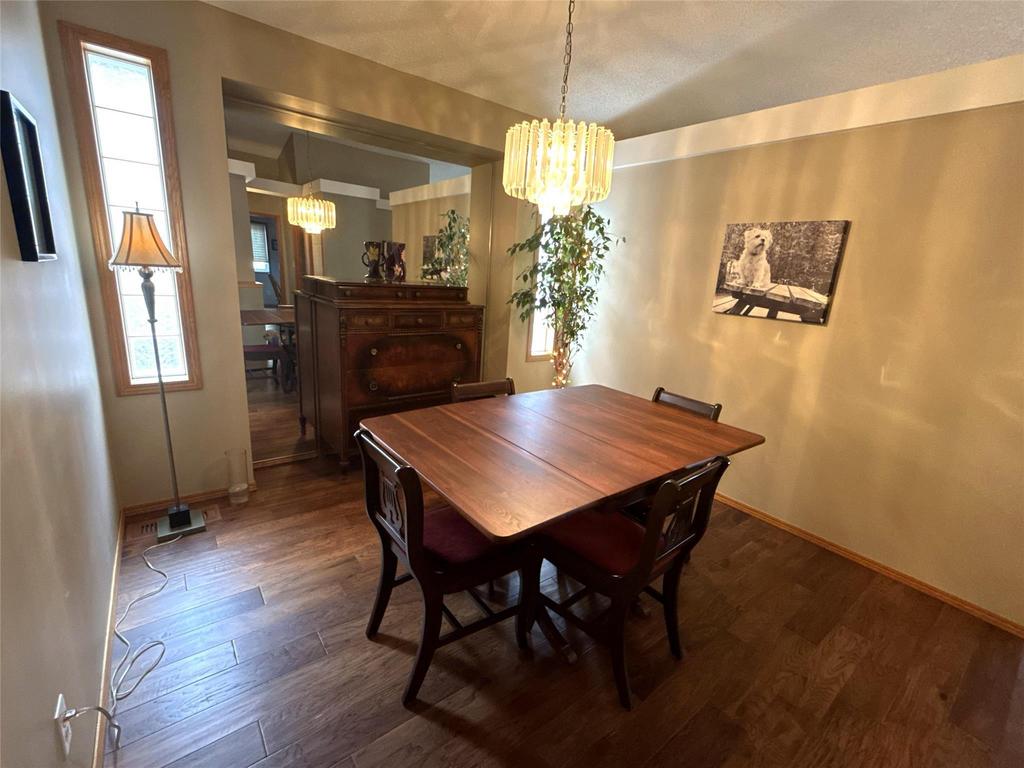 40 Forestgate Avenue, Linden Woods · dining room with a chandelier and hardwood flooring