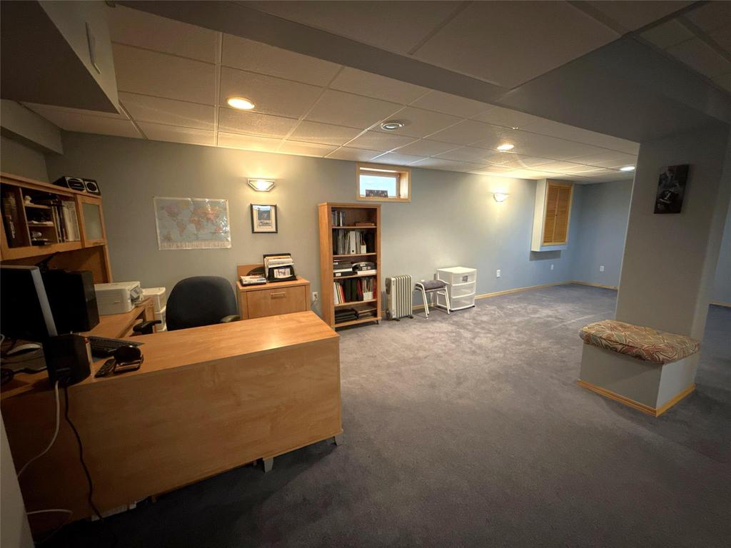 40 Forestgate Avenue, Linden Woods · basement rec room with a desk area and built-in shelving