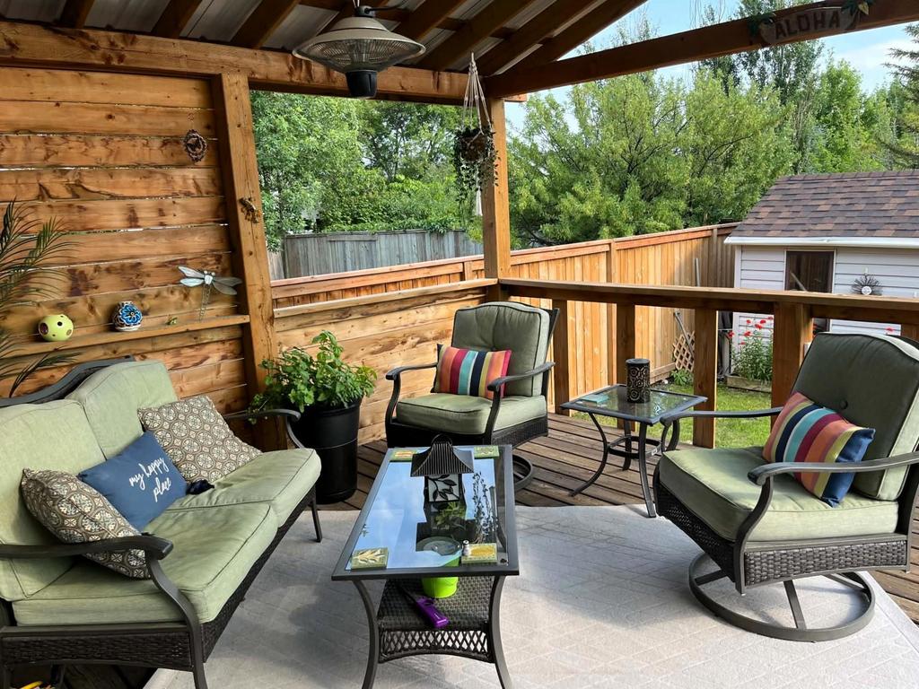 40 Forestgate Avenue, Linden Woods · covered section of the back deck with outdoor seating