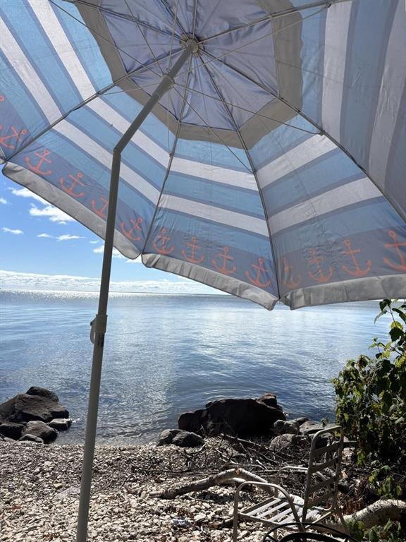 41 Little Deer Road &middot; beach umbrella set up at the water's edge