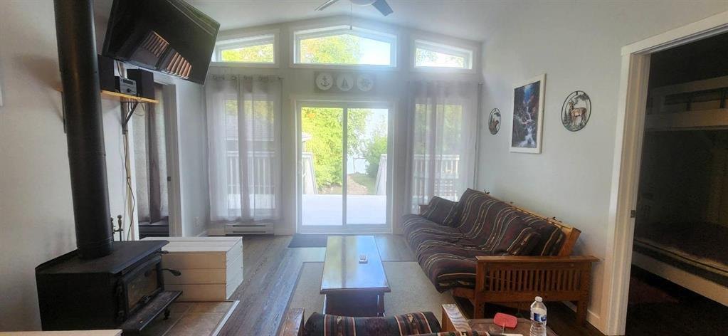 41 Little Deer Road &middot; living room looking out to the lake through the patio doors