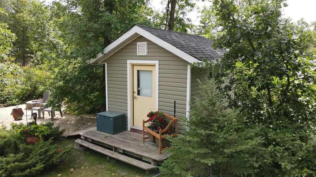 560 Prospect Street, Winnipeg Beach · 10 by 12 shed with a deck and garden beds