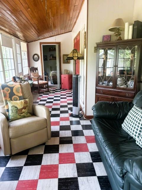 560 Prospect Street, Winnipeg Beach · sitting area with a display cabinet and leather seating