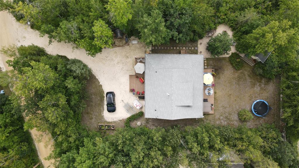 560 Prospect Street, Winnipeg Beach · overhead view of the cottage, the yard and the driveway