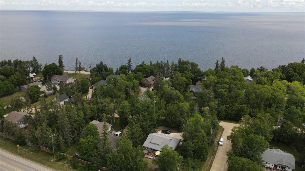 560 Prospect Street, Winnipeg Beach · aerial view along the shoreline over the surrounding cottages