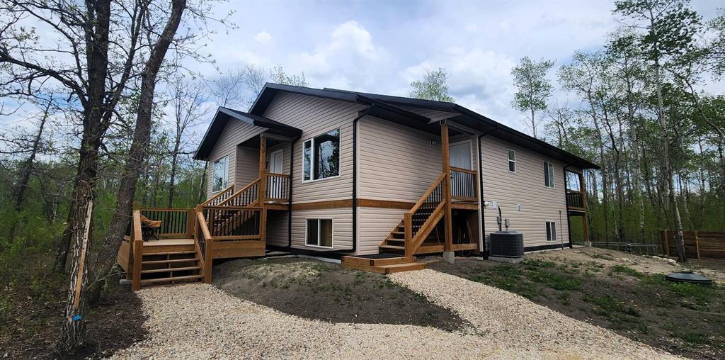 7 Surtsey Road, Sandy Hook · rear elevation with the deck stairs and gravel path