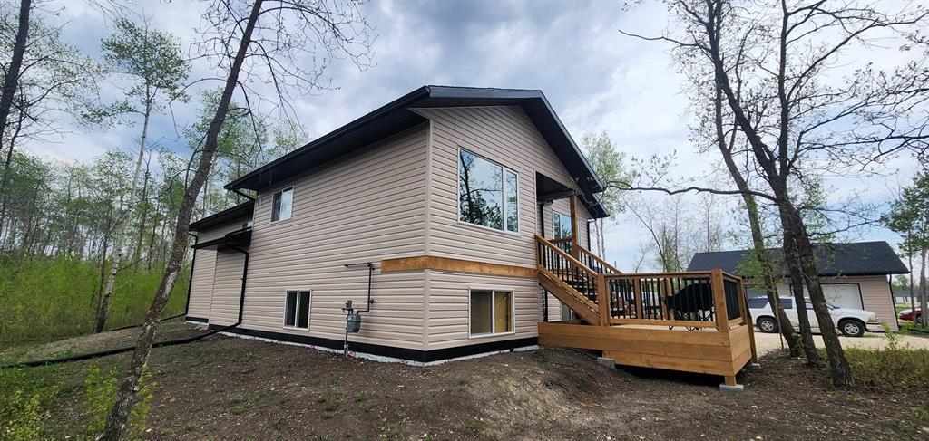 7 Surtsey Road, Sandy Hook · front corner elevation with the deck and stairs
