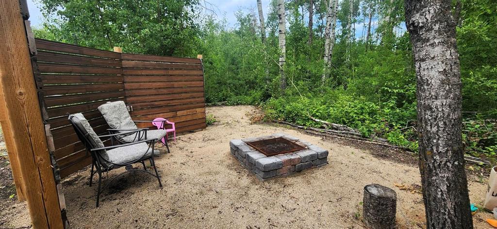 7 Surtsey Road, Sandy Hook · firepit area with privacy fence and seating