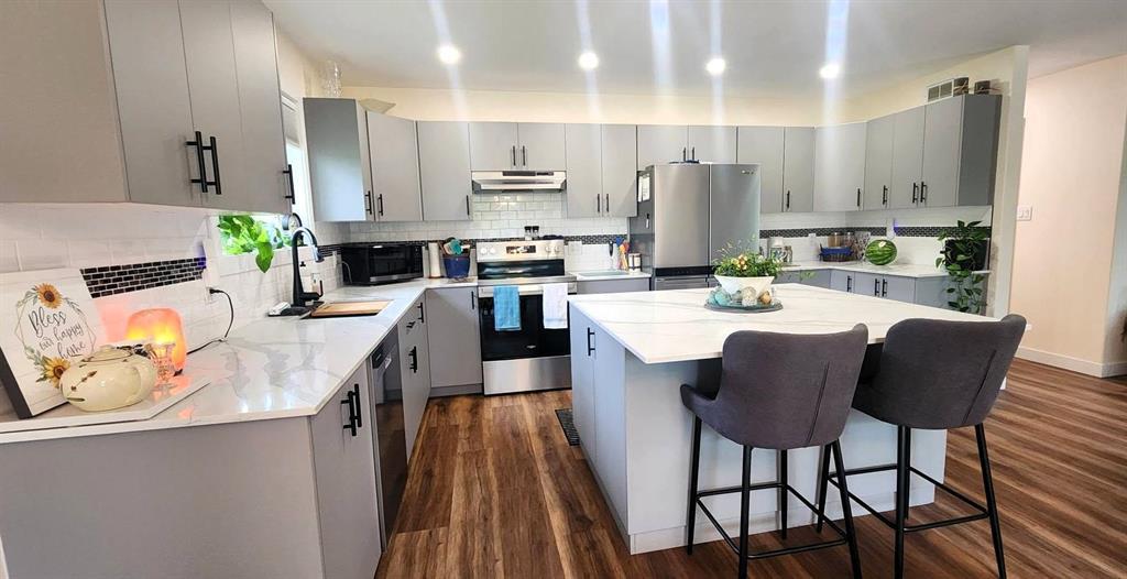 7 Surtsey Road, Sandy Hook · kitchen from the dining side, island and range