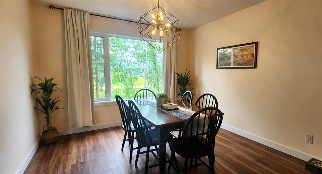 7 Surtsey Road, Sandy Hook · dining room with window and pendant light