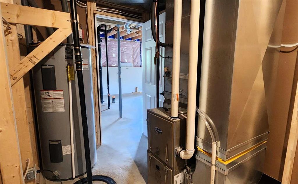 7 Surtsey Road, Sandy Hook · utility area with the furnace and water heater