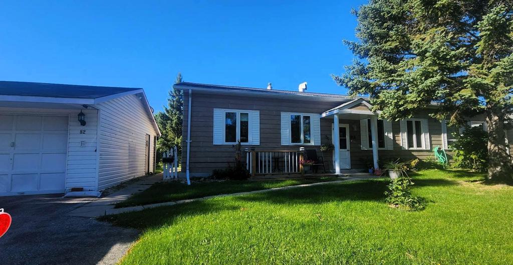 82 Willow Drive, Aspen Park &middot; the home and its garage from the driveway