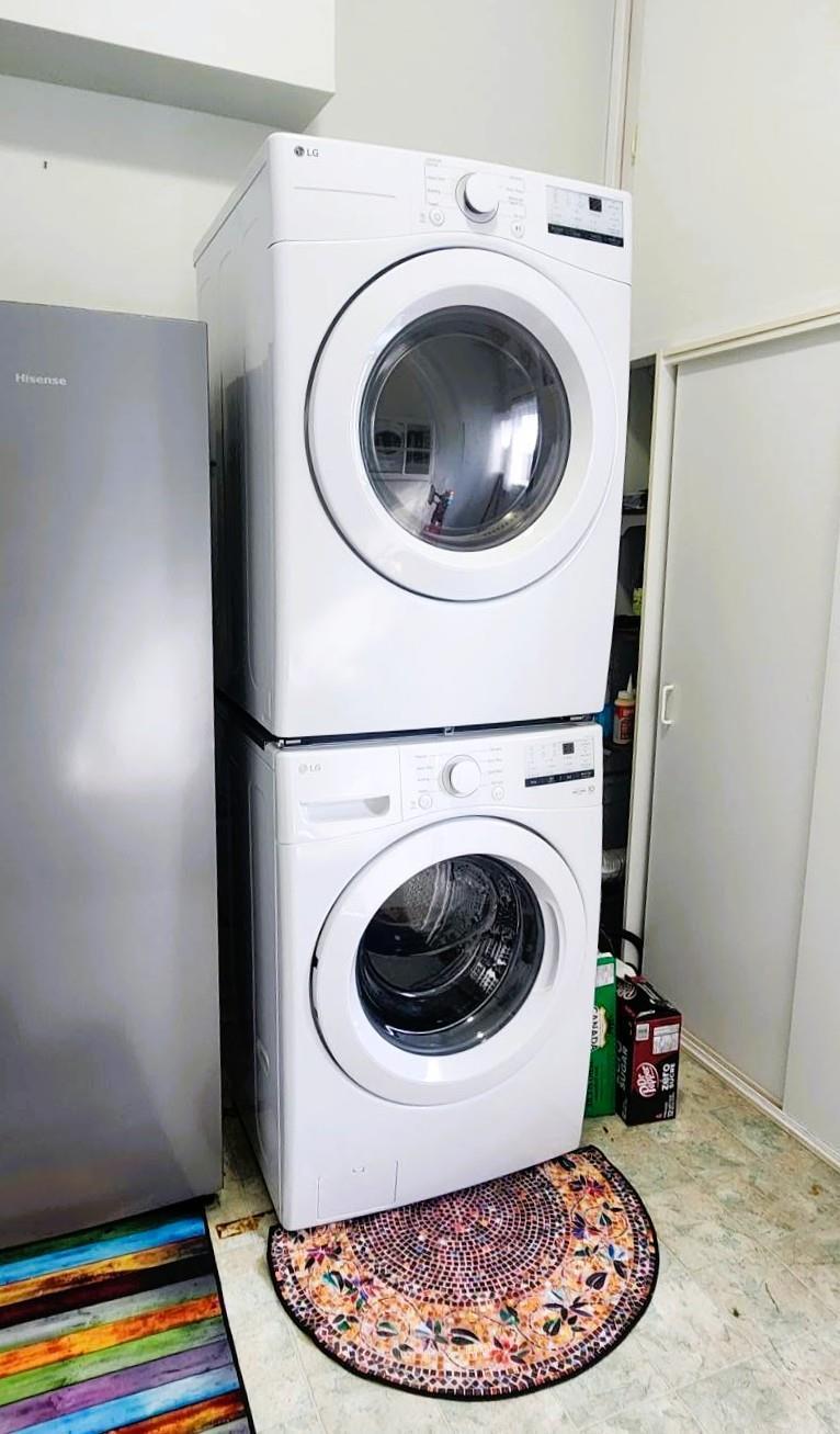 82 Willow Drive, Aspen Park &middot; laundry with a stacked washer and dryer
