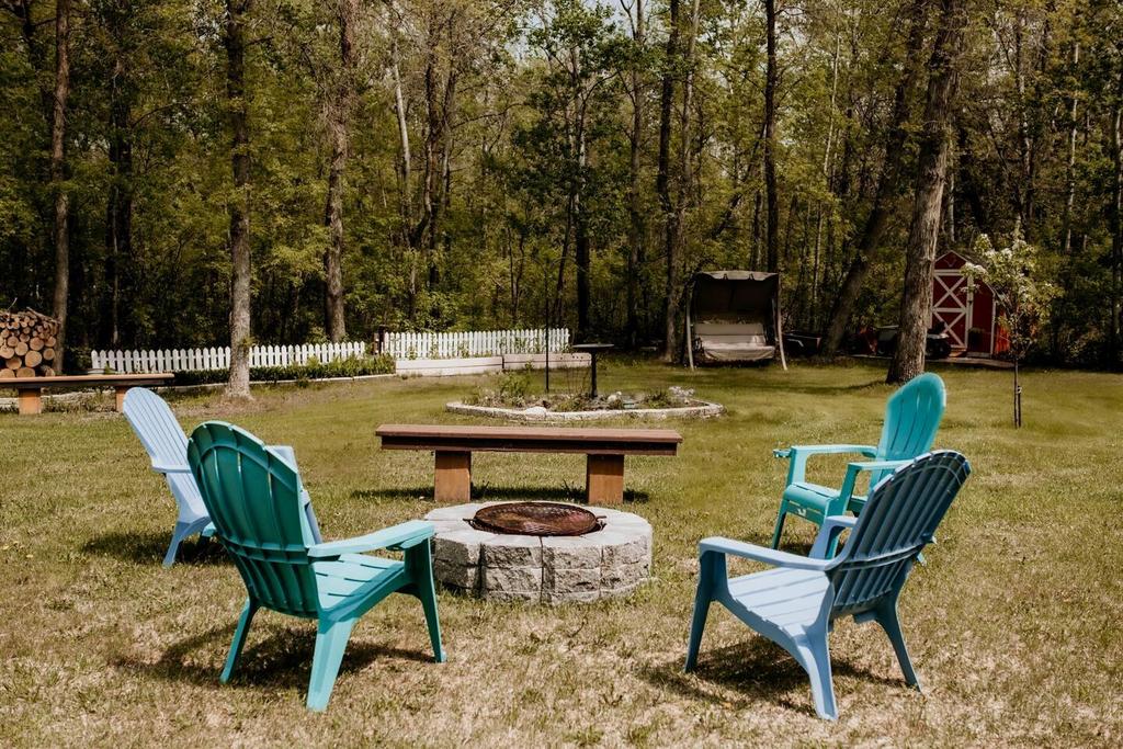899 PTH 9 Highway, Winnipeg Beach &middot; the firepit circle under mature trees
