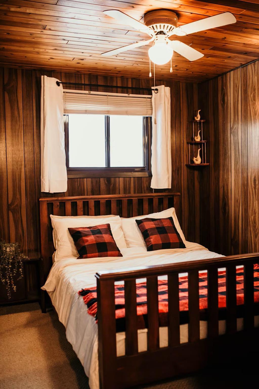 899 PTH 9 Highway, Winnipeg Beach &middot; bedroom with a double bed under the window